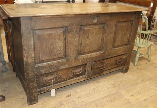 An 18th century oak mule chest W.132cm